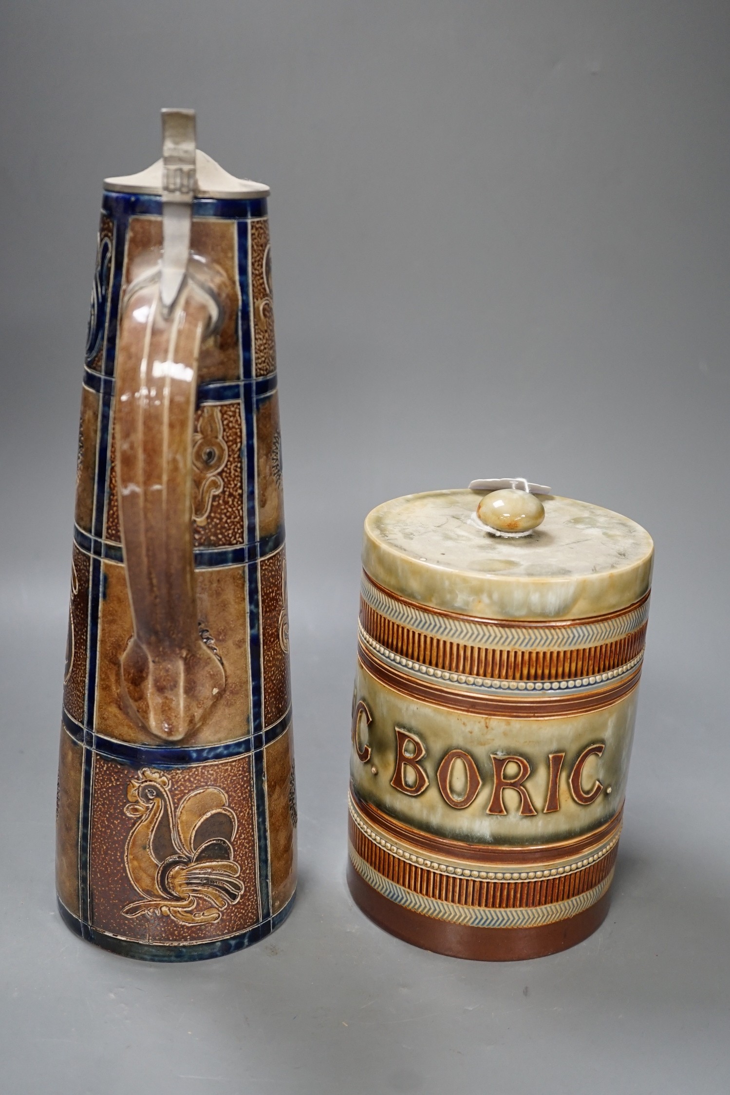 A Royal Doulton stoneware ‘UNC. BORIC.’ drug jar 18cm and a Doulton Slater’s patent flagon, 33cm